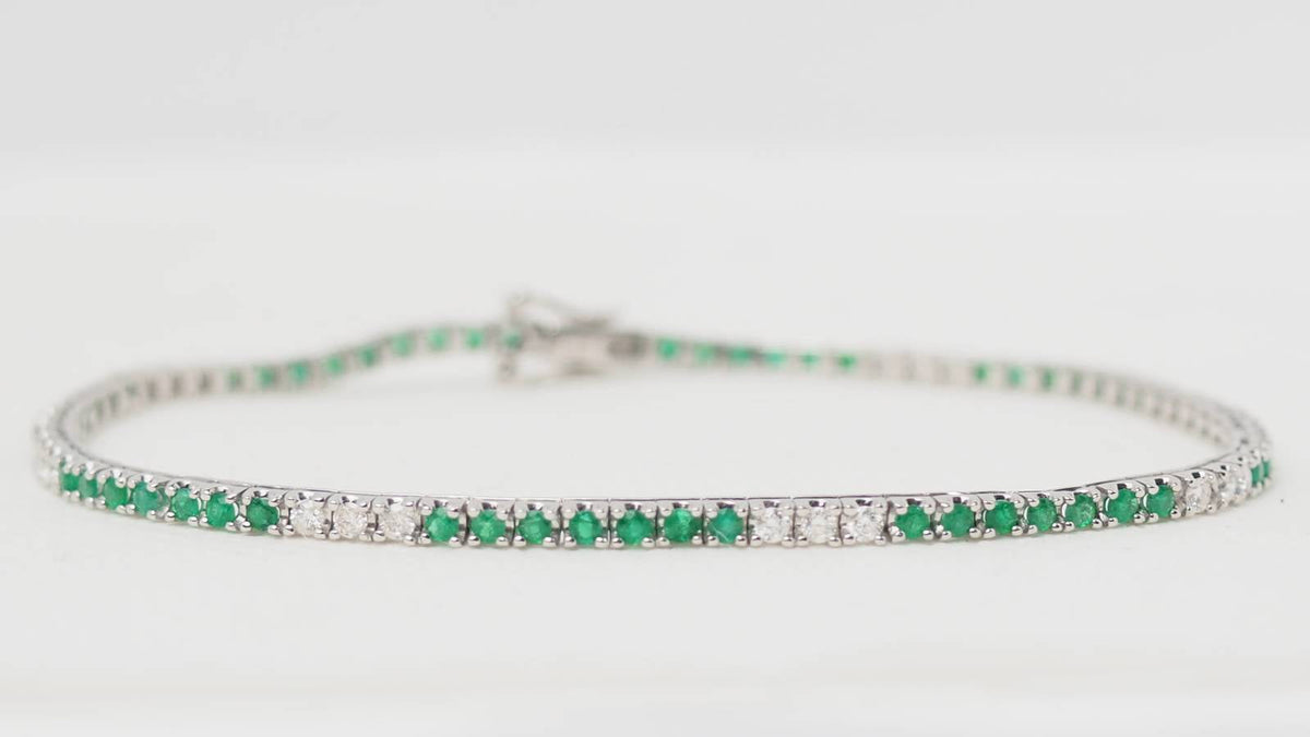 Bracelet rivière L'Aurore en or blanc 18kt serti d'émeraudes et de diamants taille brillant