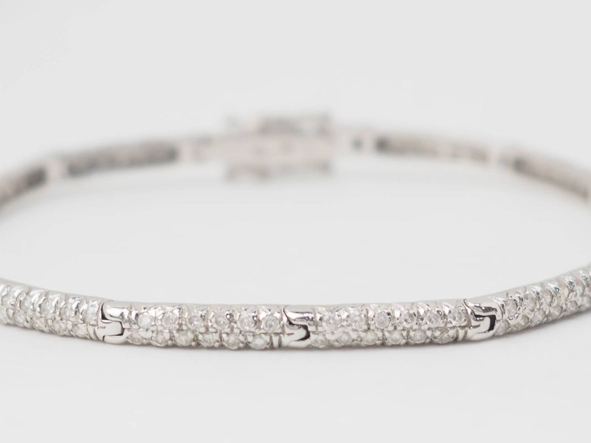 Bracelet rivière L'Aurore en or blanc 18 carats avec deux rangées de diamants taille brillant totalisant 1,10 carat