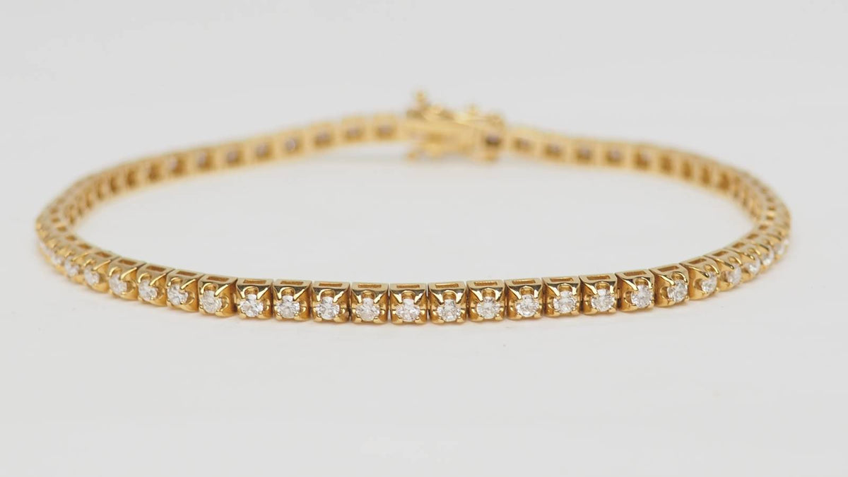 Bracelet rivière L'Aurore en or jaune 18 carats serti de 60 diamants taille brillant totalisant 1,50 carat