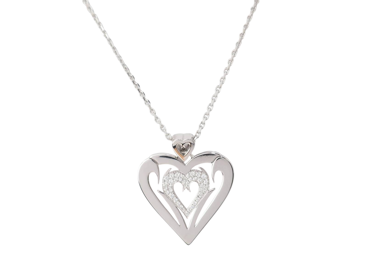 Collier L'Aurore en or blanc 18 carats avec pendentif cœur ajouré et pavage de diamants taille brillant