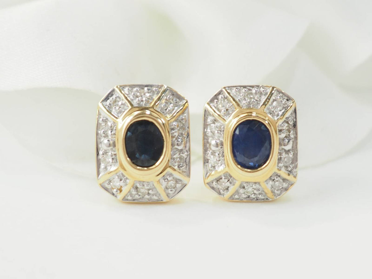 Boucles d'oreilles vintage L'Aurore en or jaune 18k, ornées de saphirs ovales et de diamants taille brillant.