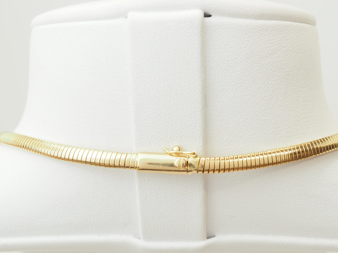 Collier Tubogas ras-de-cou en or jaune 18 carats et diamants