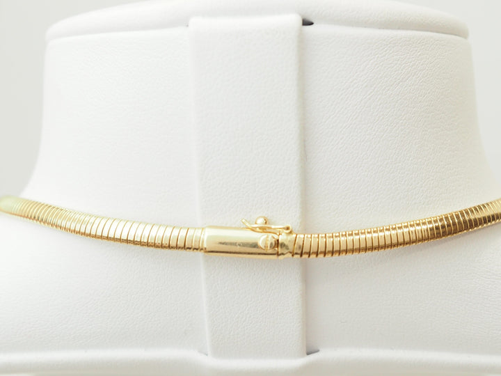 Collier Tubogas ras-de-cou en or jaune 18 carats et diamants