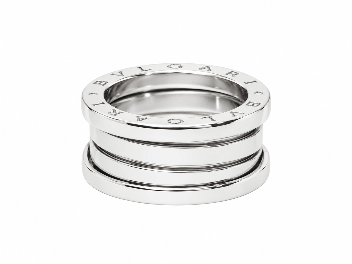 Bague Bvlgari B.ZERO1 en or blanc 18 carats, 8 mm de largeur, avec signature gravée, proposée par L'Aurore