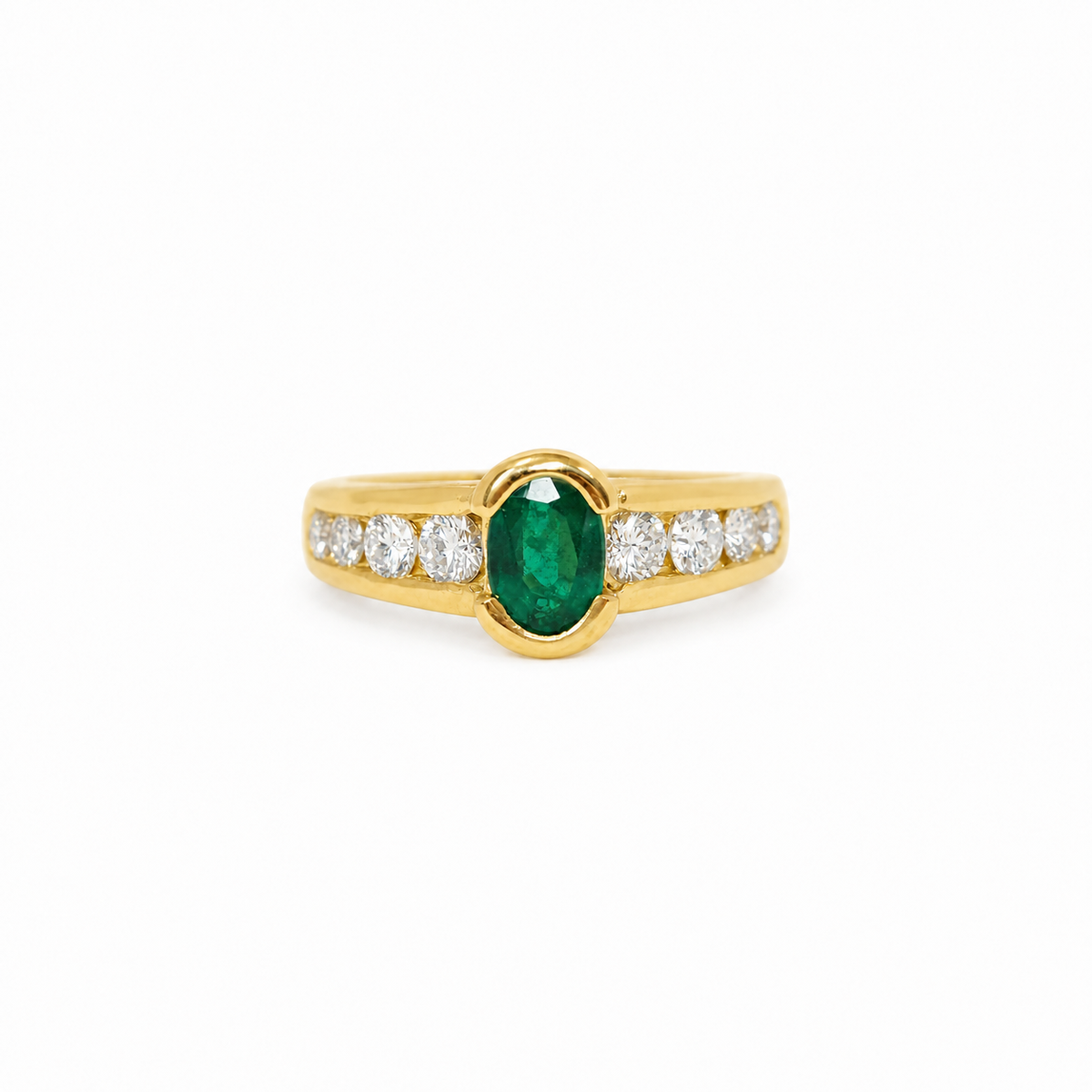 Bague L'Aurore en or jaune 18 carats avec émeraude ovale centrale et diamants sertis sur les côtés