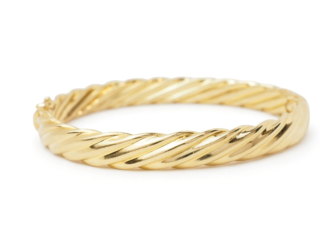 Bracelet jonc L'Aurore en or jaune 18 carats au design torsadé élégant et finition polie brillante