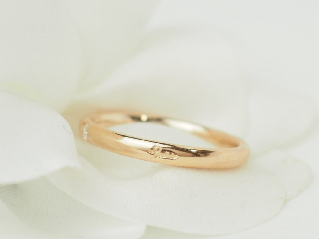 Bague Pomellato Lucciole en or rose 18 carats avec un diamant brillant, proposée par L&