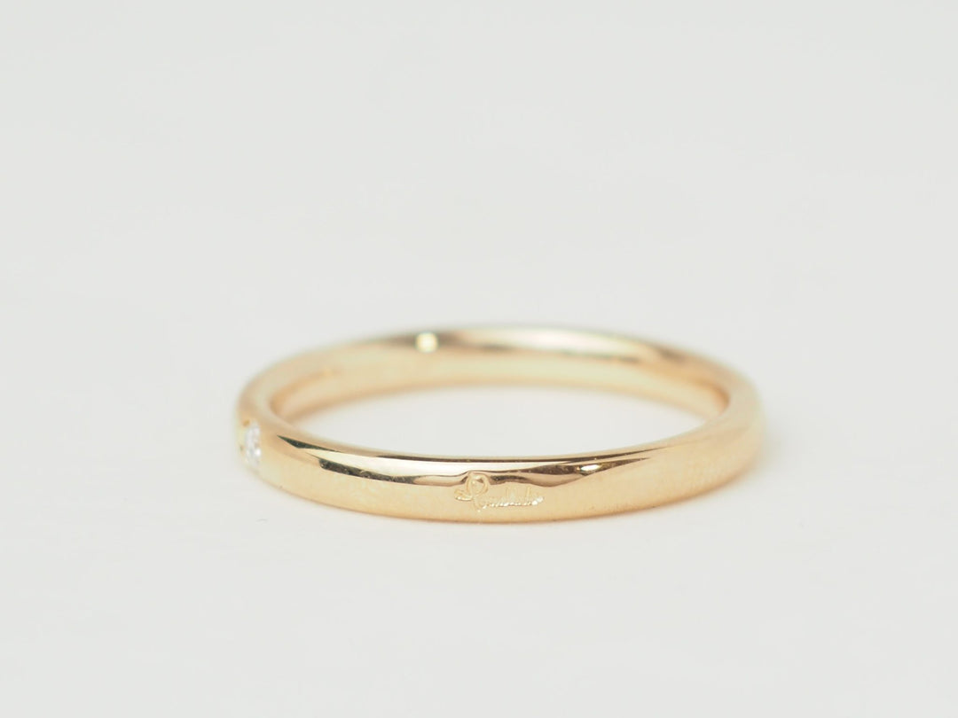 Bague Pomellato Lucciole en or rose 18 carats avec un diamant brillant, vendue par L&