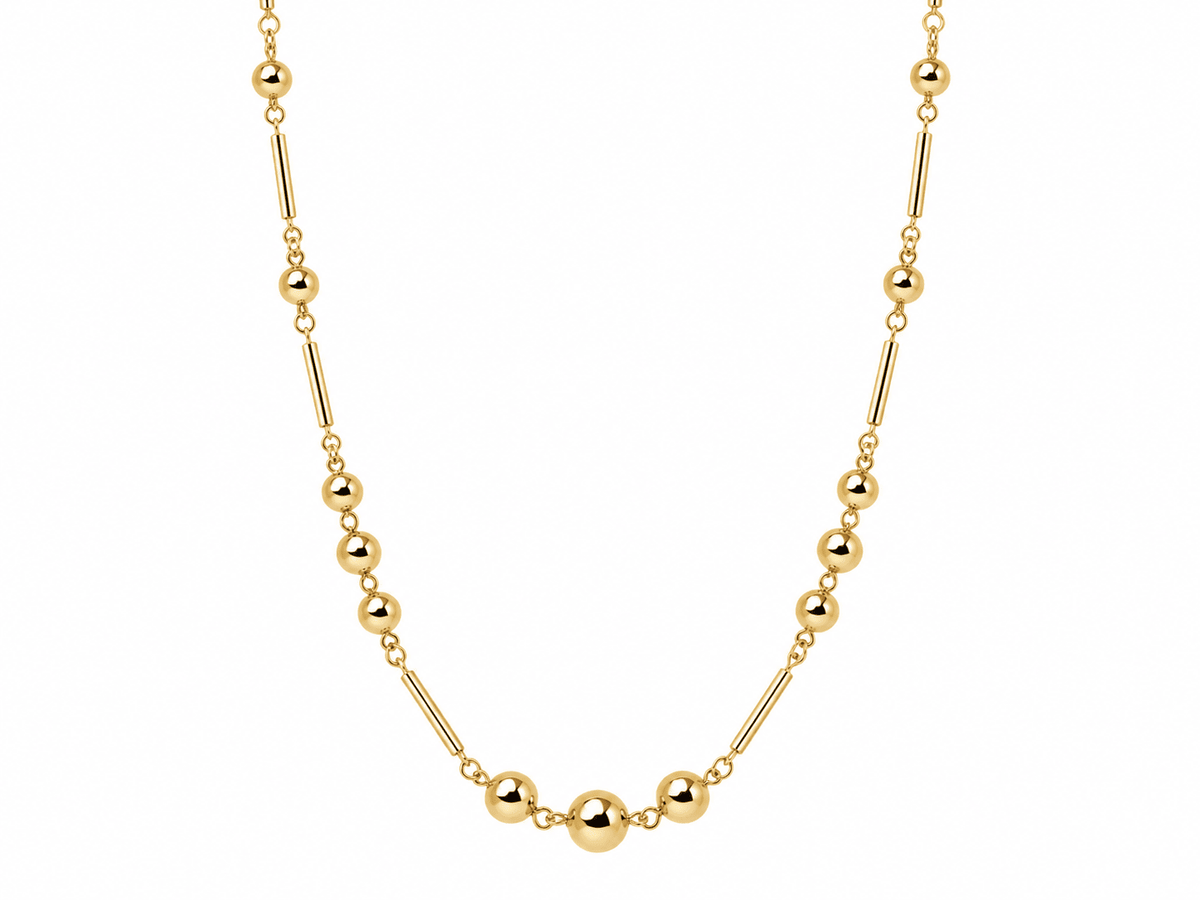 Collier vintage L'Aurore en or rose 18 carats composé d'une alternance de boules et de barres, longueur 50 cm