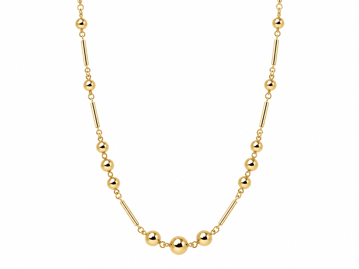 Collier vintage L'Aurore en or rose 18 carats composé d'une alternance de boules et de barres, longueur 50 cm