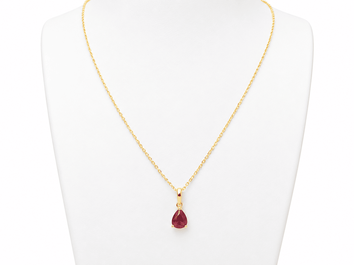 Pendentif L'Aurore en or jaune 18 carats avec un rubis naturel taille poire de 1,76 carat sur un buste blanc