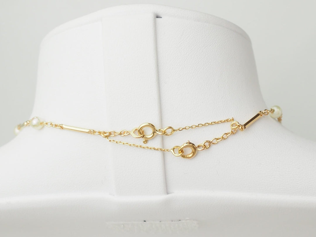 Détail du fermoir et de la chaîne en or jaune 18kt du collier L&