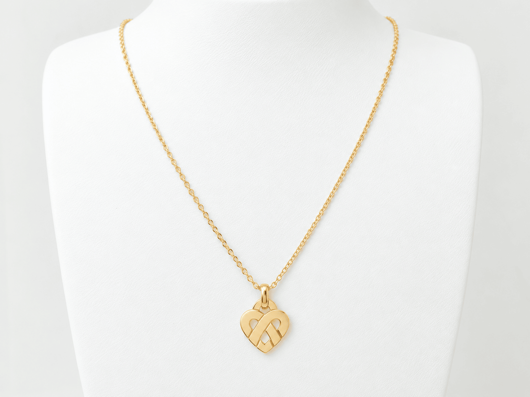 Pendentif Poiray  coeur entrelacé petit modèle en or jaune