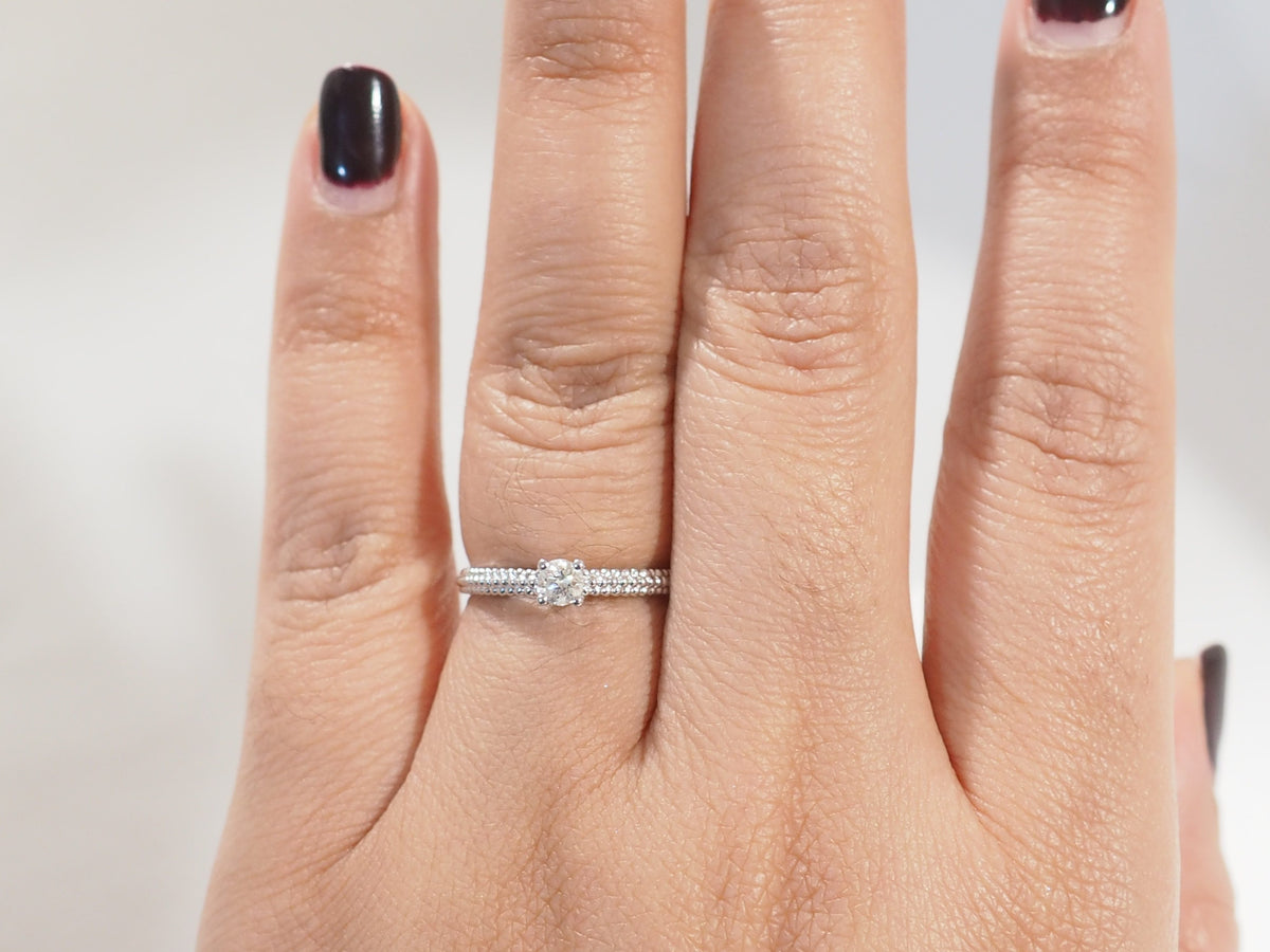 Bague solitaire Mauboussin "Fan du premier jour" en or blanc et diamant