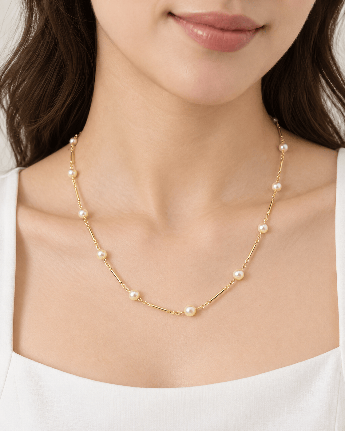 Collier en or jaune à perles – Boules alternées par des barres