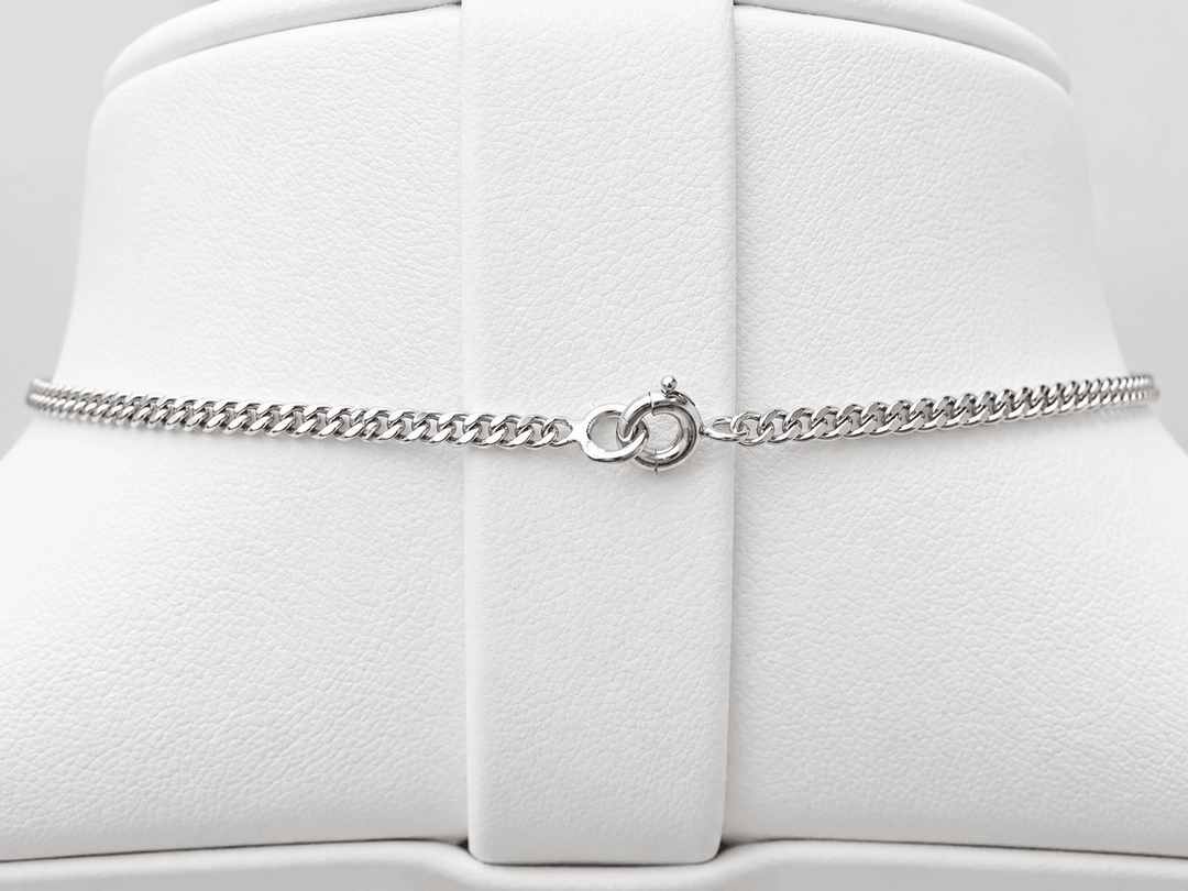 Fermoir rond en or blanc du collier L&