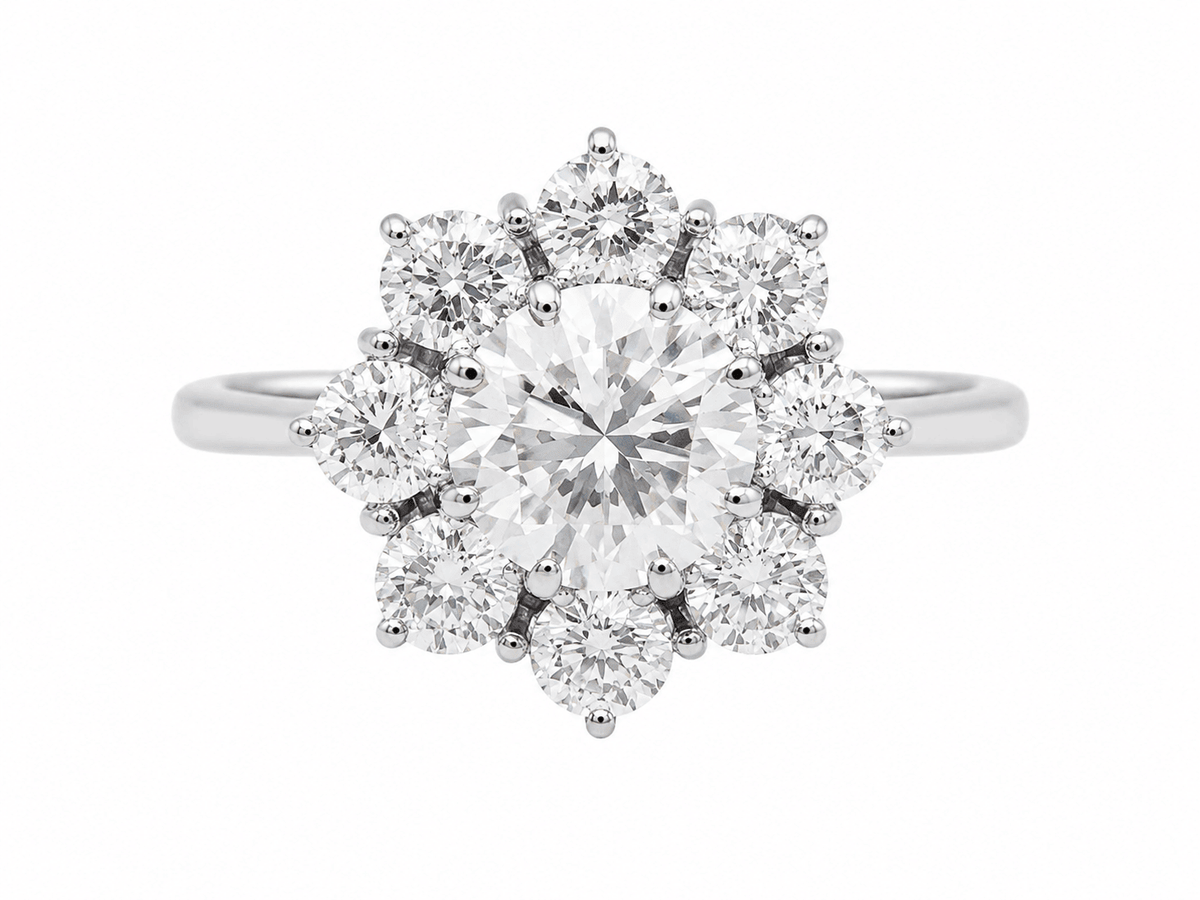 Bague marguerite L'Aurore en or blanc 18 carats avec diamant central de 1,80 carat et entourage de diamants