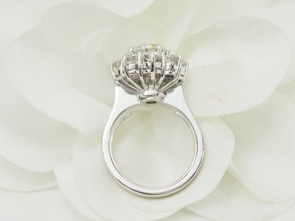 Bague marguerite ancienne L'Aurore en or blanc 18 carats avec diamant central de 1,80 carat et entourage de brillants