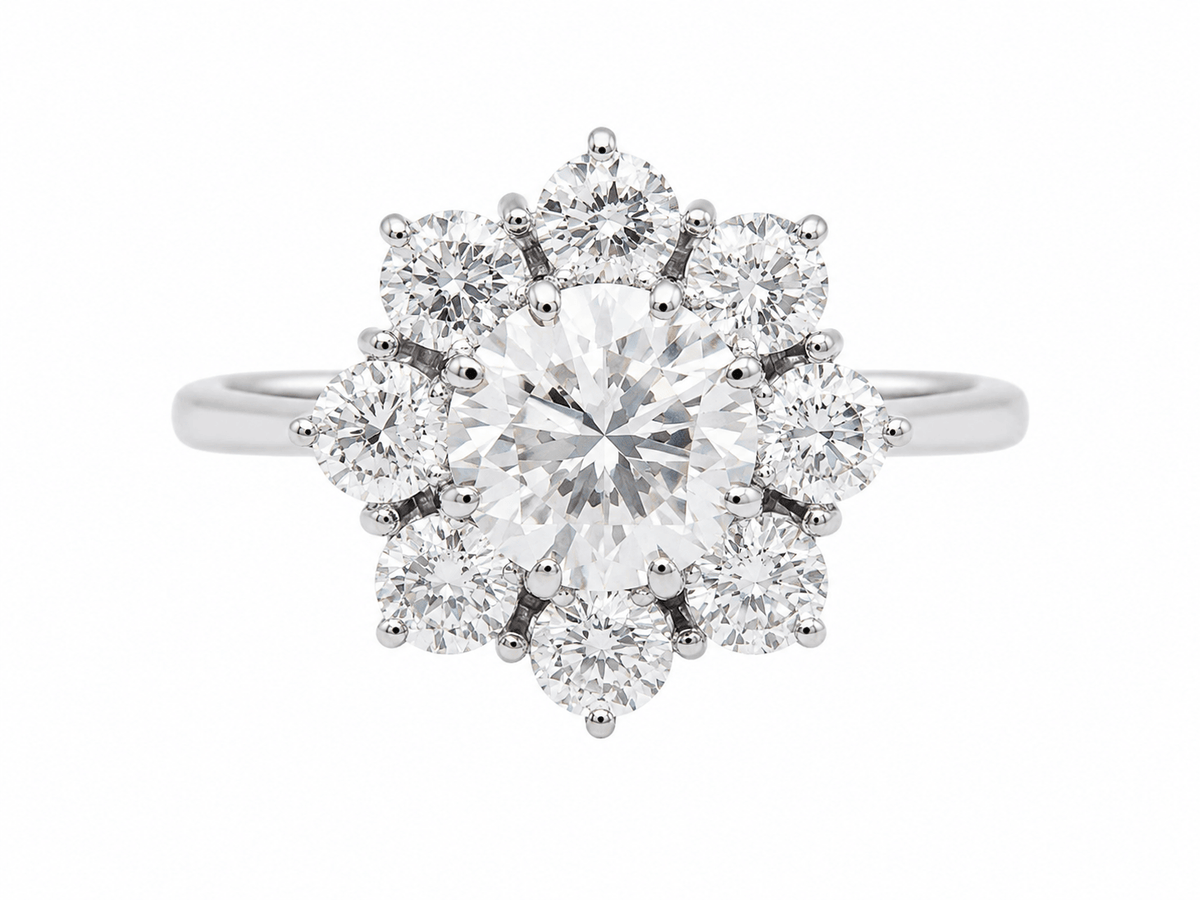 Bague marguerite L'Aurore en or blanc 18 carats avec diamant central de 1,80 carat et entourage de diamants
