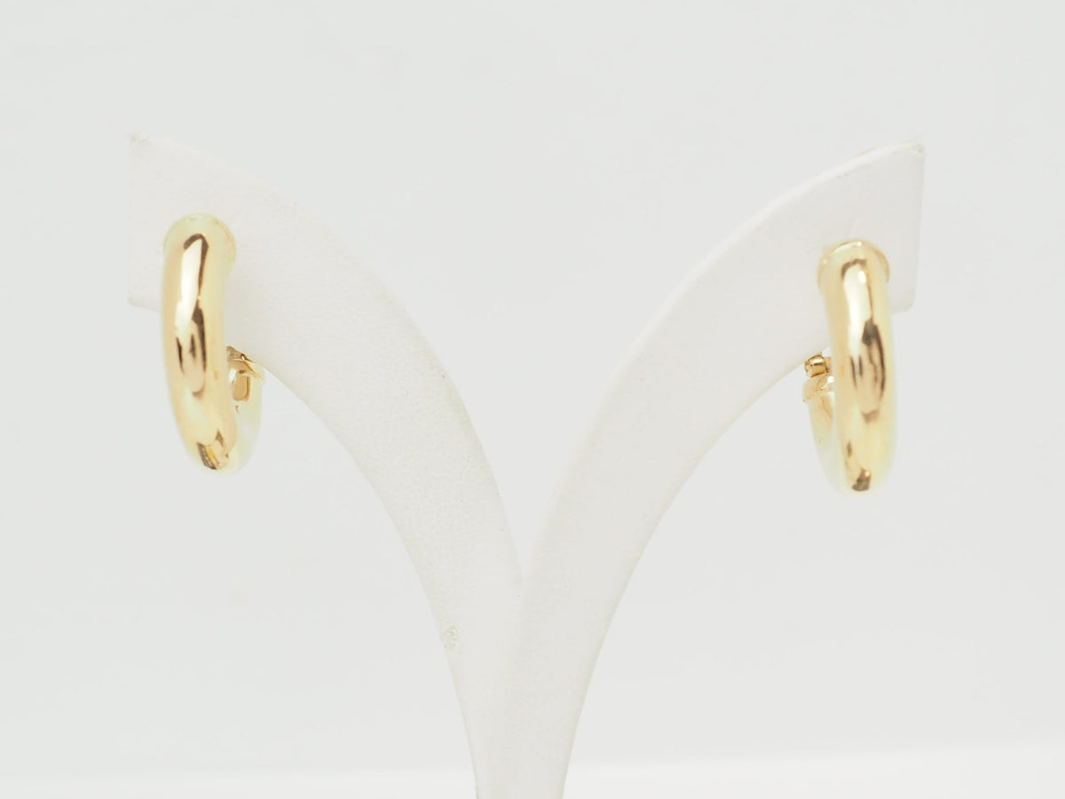 Boucles d'oreilles créoles épaisses L'Aurore en or jaune 18 carats poli, diamètre 23 mm avec fermoir à charnière.