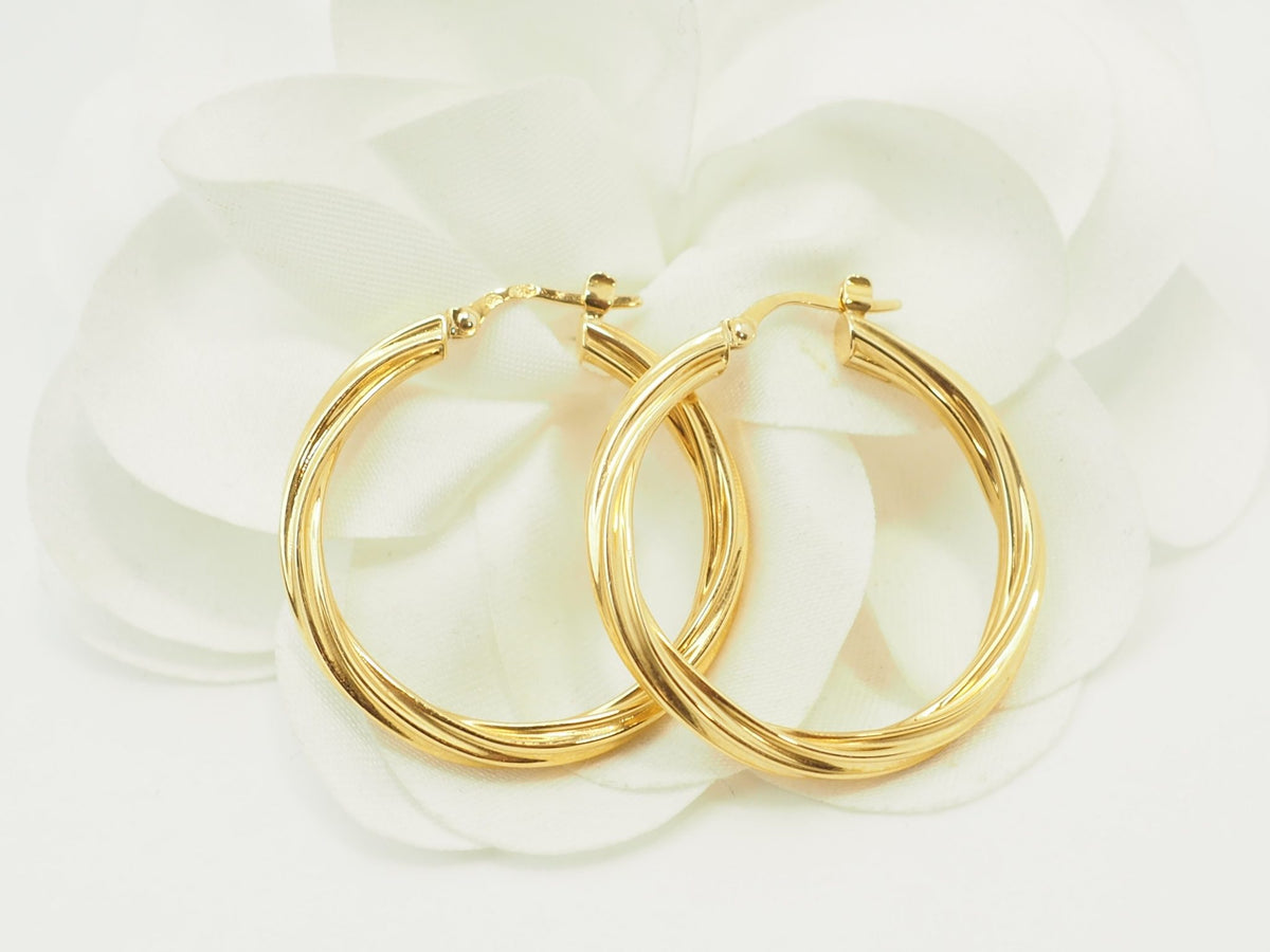Créoles torsadées L'Aurore en or jaune 18 carats, diamètre 30 mm avec finition polie brillante