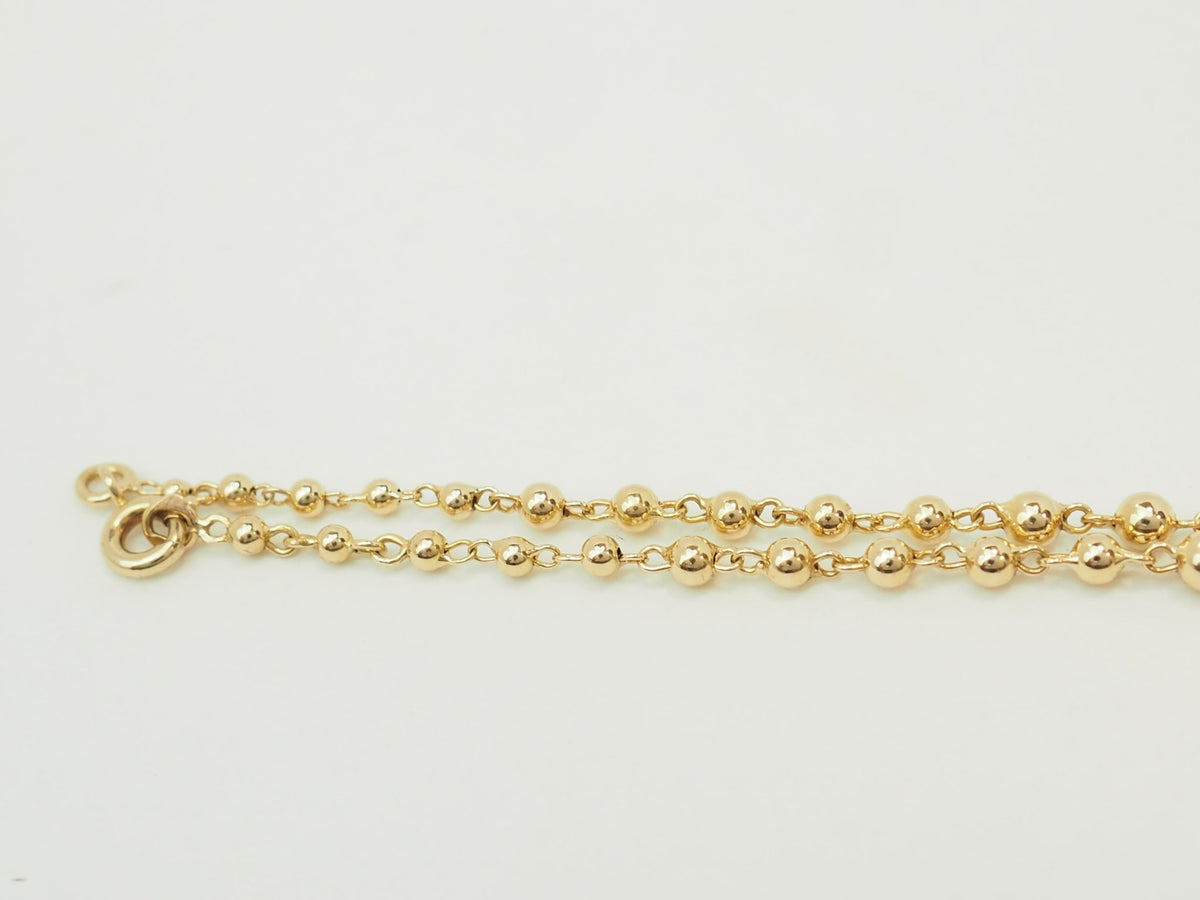 Collier marseillais vintage L'Aurore en or jaune 18 carats avec boules de diamètres gradués et fermoir sécurisé