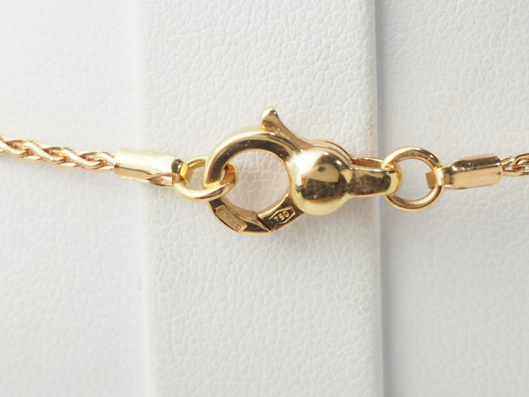 Collier pendentif fleur en or rose, pierres fines et diamants