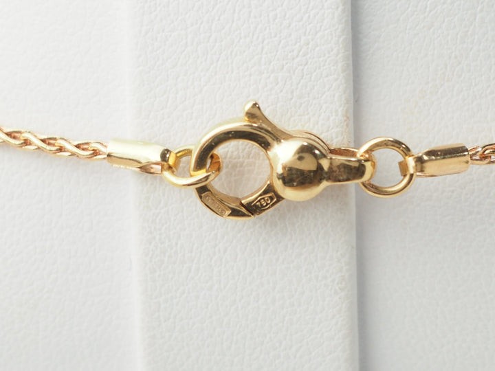 Collier pendentif fleur en or rose, pierres fines et diamants