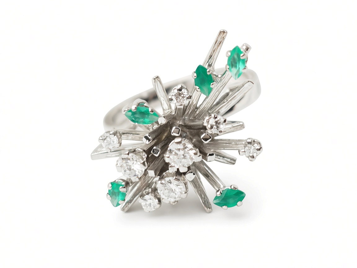 Bague bouquet vintage L'Aurore en or blanc 18 carats ornée d'émeraudes et de diamants, style années 1970.