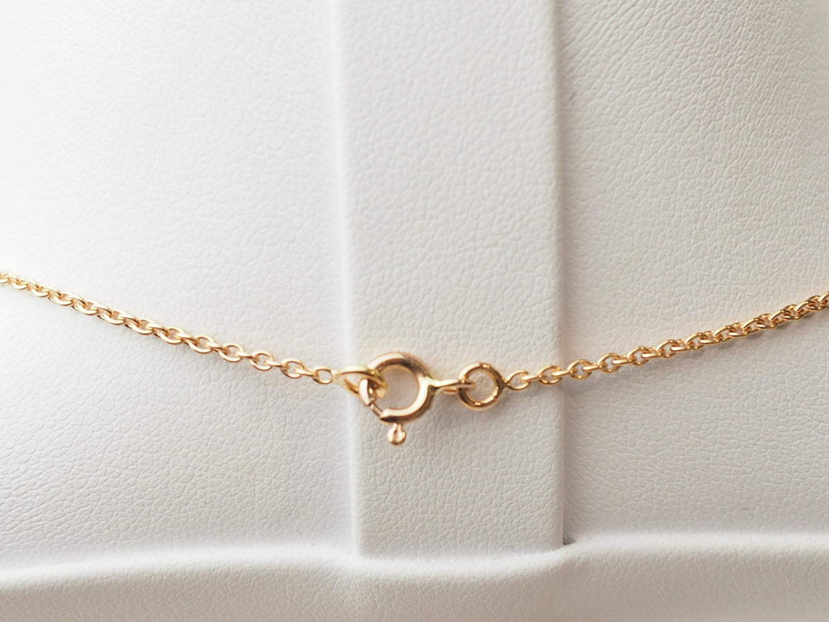 Collier trèfle en or rose et diamants