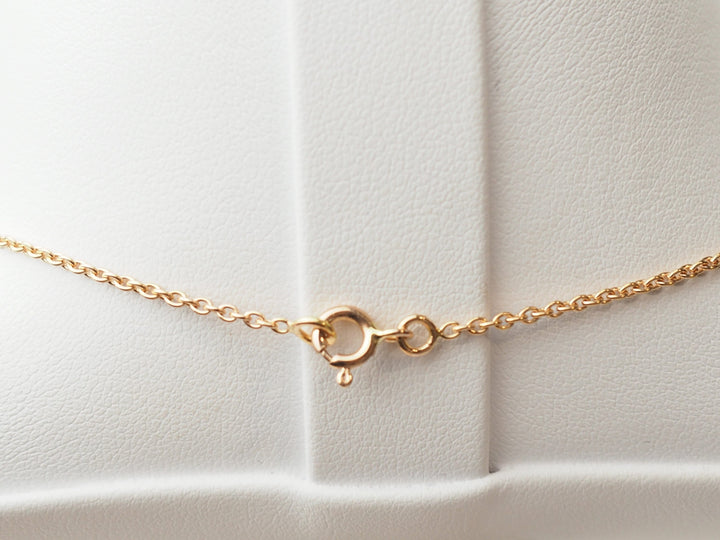 Collier trèfle en or rose et diamants